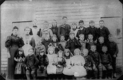 Montgomery with pupils from the Belmont School, circa 1897